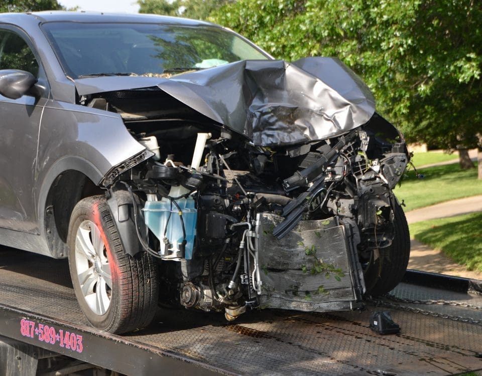 car being towed after a collision